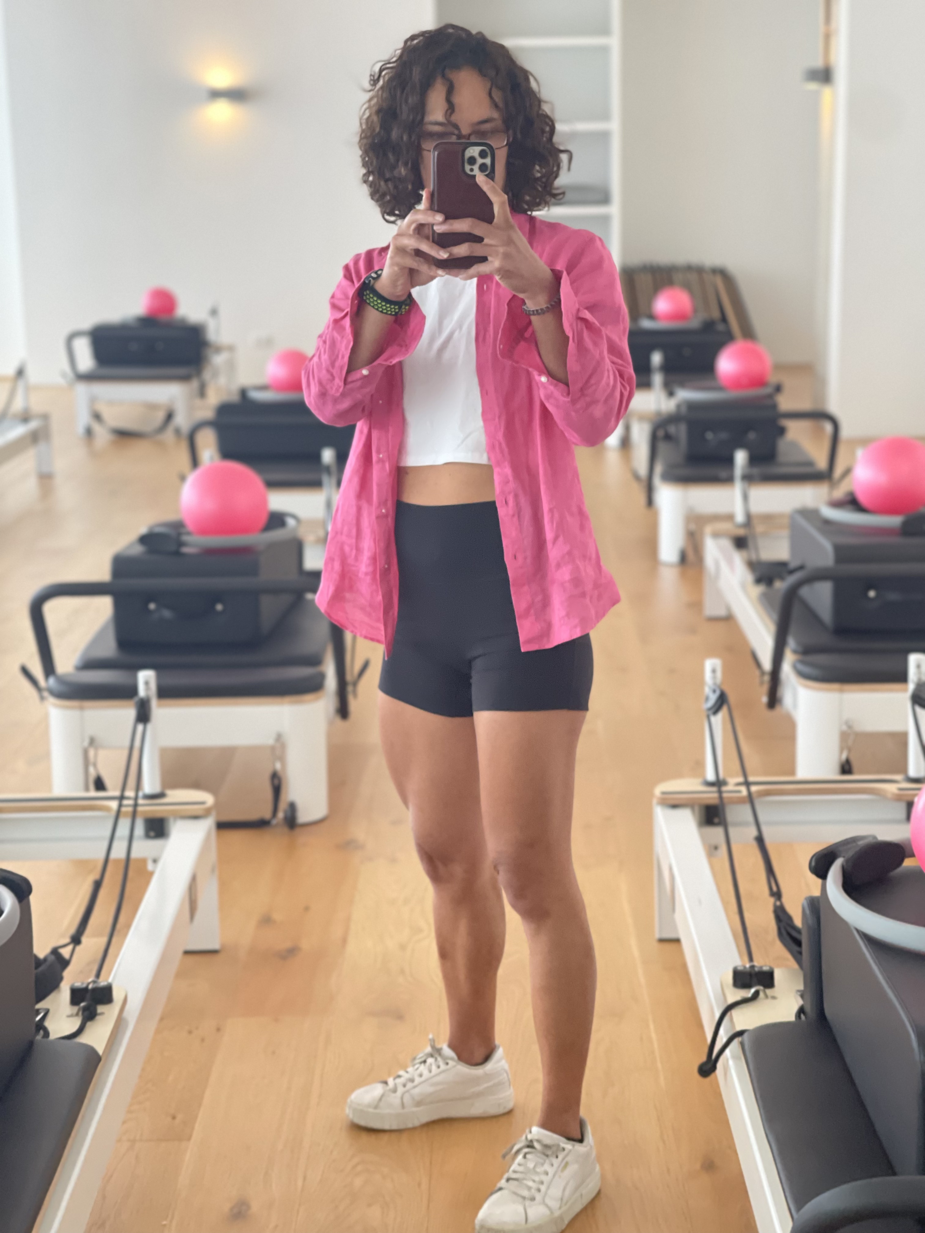 Tia in her Pilates reformer studio